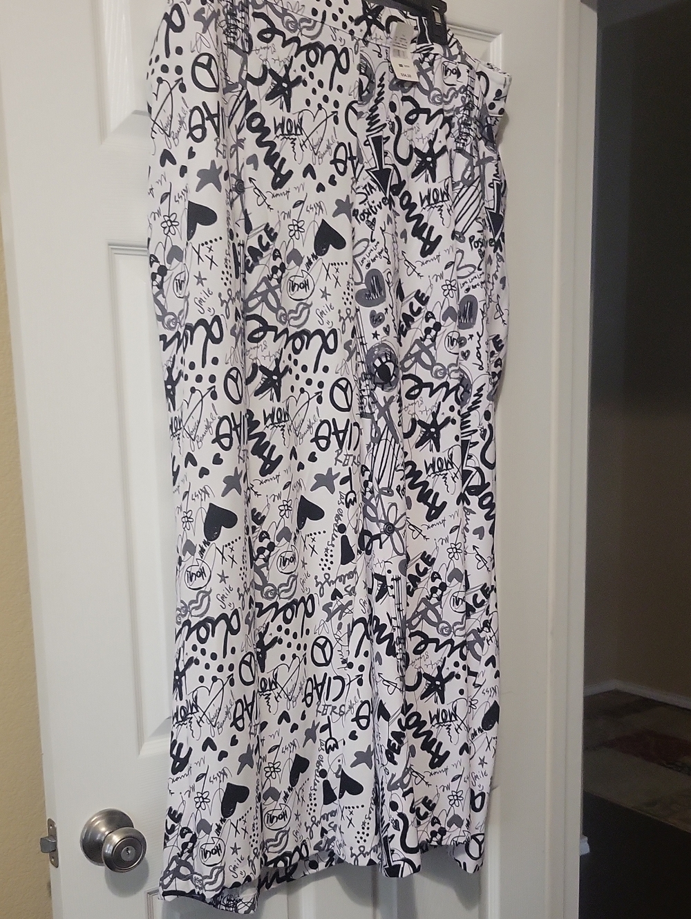 Ashley Stewart Black & White Graphic Print Flare Pants